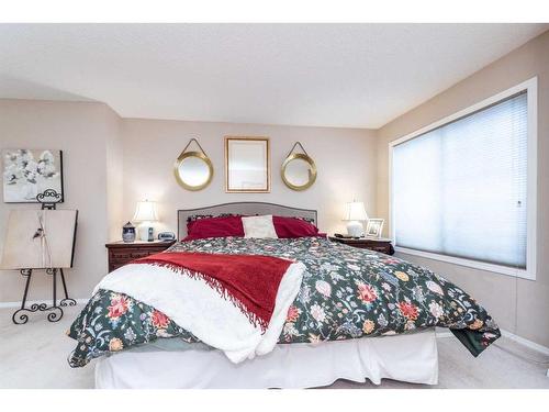 215 Chapalina Place Se, Calgary, AB - Indoor Photo Showing Bedroom