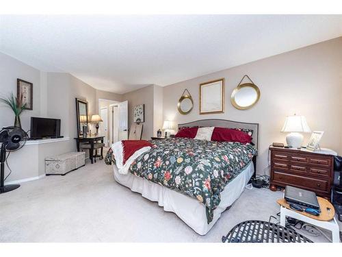 215 Chapalina Place Se, Calgary, AB - Indoor Photo Showing Bedroom