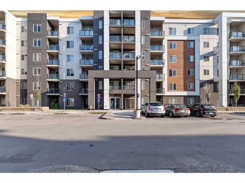 1605-4641 128 Avenue Ne, Calgary, AB - Outdoor With Balcony With Facade