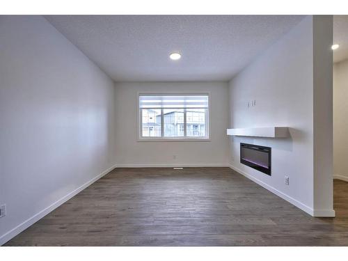 123 Legacy Reach Court Se, Calgary, AB - Indoor With Fireplace