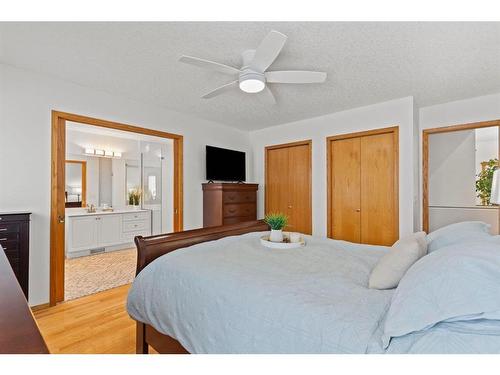 37 Sandstone Ridge Crescent, Okotoks, AB - Indoor Photo Showing Bedroom