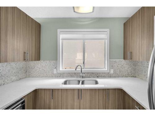 262 Martinwood Place Ne, Calgary, AB - Indoor Photo Showing Kitchen With Double Sink