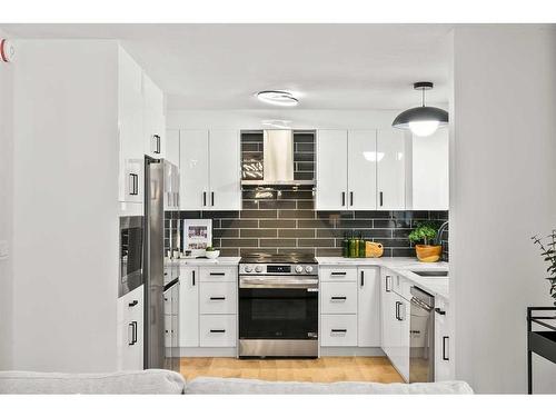 220 Queen Anne Place Se, Calgary, AB - Indoor Photo Showing Kitchen With Upgraded Kitchen