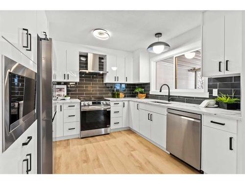 220 Queen Anne Place Se, Calgary, AB - Indoor Photo Showing Kitchen With Upgraded Kitchen