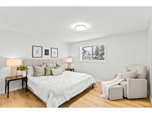 220 Queen Anne Place Se, Calgary, AB - Indoor Photo Showing Bedroom