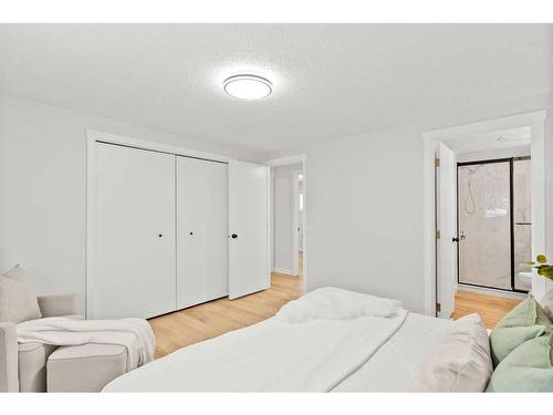 220 Queen Anne Place Se, Calgary, AB - Indoor Photo Showing Bedroom