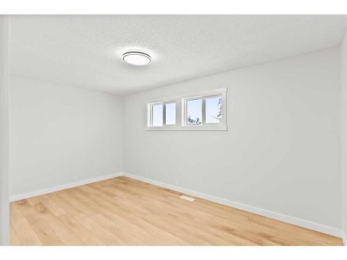 220 Queen Anne Place Se, Calgary, AB - Indoor Photo Showing Other Room