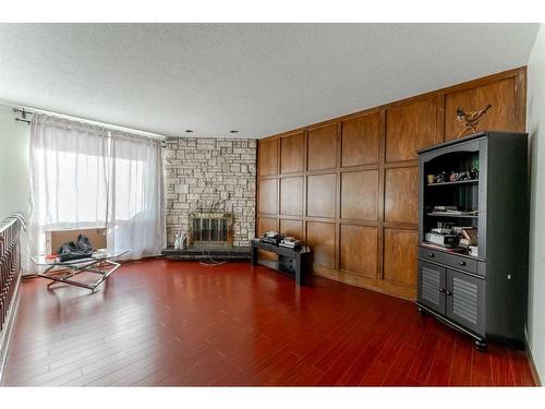 5807 22 Avenue Ne, Calgary, AB - Indoor Photo Showing Living Room With Fireplace