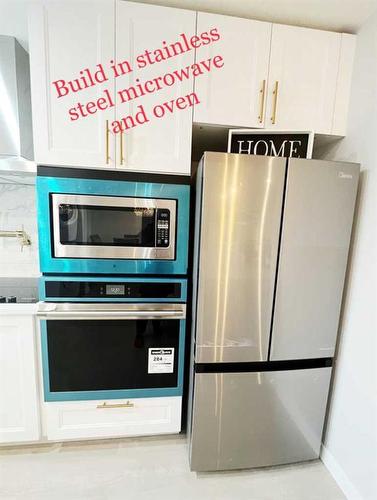 7119 Huntercrest Road Nw, Calgary, AB - Indoor Photo Showing Kitchen