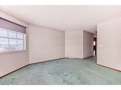 7 Wilson Road Ne, Langdon, AB - Indoor Photo Showing Other Room