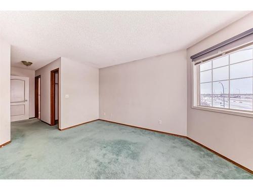 7 Wilson Road Ne, Langdon, AB - Indoor Photo Showing Other Room