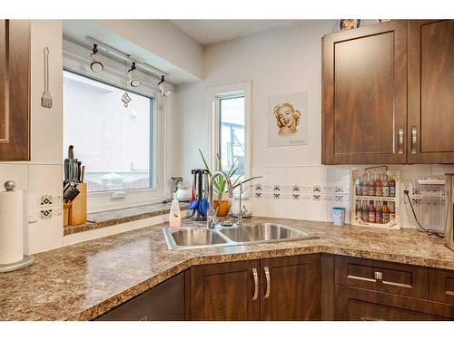 72 Beaconsfield Way Nw, Calgary, AB - Indoor Photo Showing Kitchen With Double Sink