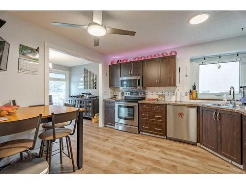 72 Beaconsfield Way Nw, Calgary, AB - Indoor Photo Showing Kitchen With Double Sink