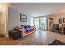 72 Beaconsfield Way Nw, Calgary, AB  - Indoor Photo Showing Living Room 