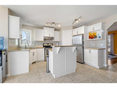 185 Simcoe Circle Sw, Calgary, AB - Indoor Photo Showing Kitchen With Stainless Steel Kitchen With Upgraded Kitchen