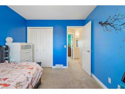 185 Simcoe Circle Sw, Calgary, AB - Indoor Photo Showing Bedroom