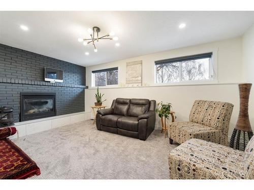 167 Whitestone Crescent Ne, Calgary, AB - Indoor Photo Showing Living Room With Fireplace