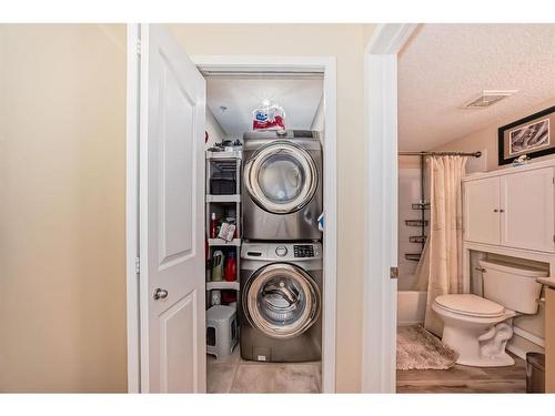 1215-16969 24 Street Sw, Calgary, AB - Indoor Photo Showing Laundry Room