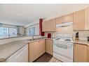 1215-16969 24 Street Sw, Calgary, AB  - Indoor Photo Showing Kitchen With Double Sink 