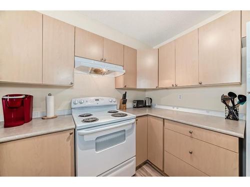 1215-16969 24 Street Sw, Calgary, AB - Indoor Photo Showing Kitchen