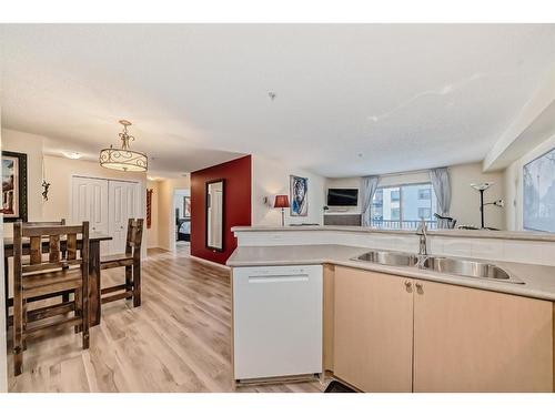 1215-16969 24 Street Sw, Calgary, AB - Indoor Photo Showing Kitchen With Double Sink