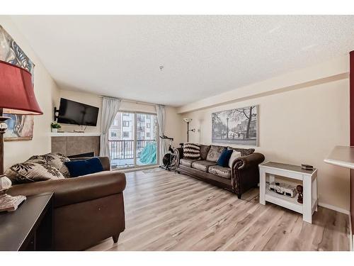 1215-16969 24 Street Sw, Calgary, AB - Indoor Photo Showing Living Room