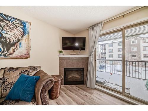 1215-16969 24 Street Sw, Calgary, AB - Indoor With Fireplace