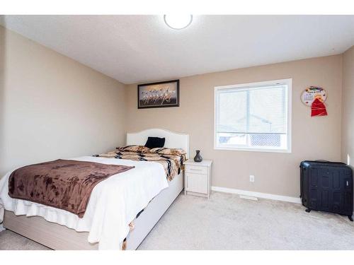 23 Saddlemont Way Ne, Calgary, AB - Indoor Photo Showing Bedroom