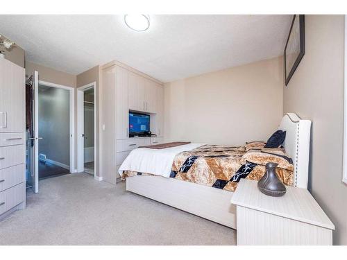 23 Saddlemont Way Ne, Calgary, AB - Indoor Photo Showing Bedroom