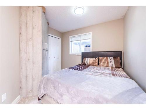 23 Saddlemont Way Ne, Calgary, AB - Indoor Photo Showing Bedroom