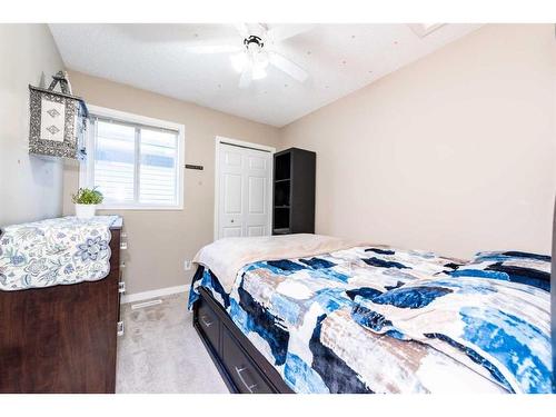 23 Saddlemont Way Ne, Calgary, AB - Indoor Photo Showing Bedroom