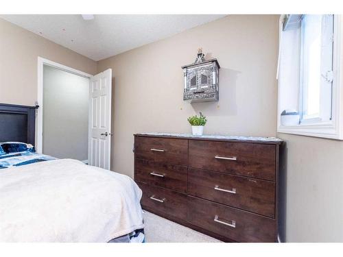 23 Saddlemont Way Ne, Calgary, AB - Indoor Photo Showing Bedroom