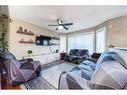 23 Saddlemont Way Ne, Calgary, AB  - Indoor Photo Showing Living Room 