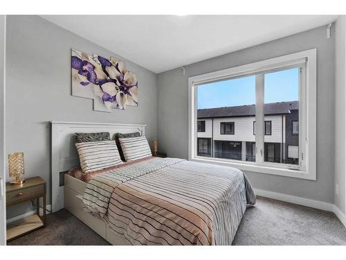 326 Evanscrest Square Nw, Calgary, AB - Indoor Photo Showing Bedroom