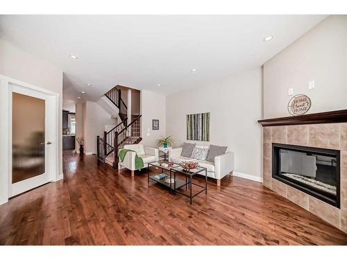 2416 1 Avenue Nw, Calgary, AB - Indoor Photo Showing Living Room With Fireplace