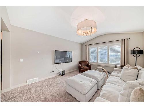 54 Copperpond Heath Se, Calgary, AB - Indoor Photo Showing Living Room