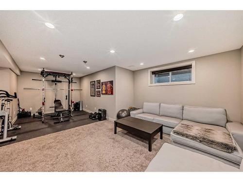 54 Copperpond Heath Se, Calgary, AB - Indoor Photo Showing Gym Room