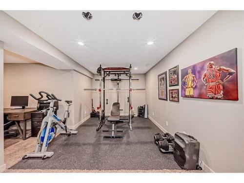 54 Copperpond Heath Se, Calgary, AB - Indoor Photo Showing Gym Room