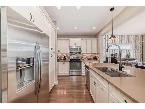 54 Copperpond Heath Se, Calgary, AB - Indoor Photo Showing Kitchen With Double Sink