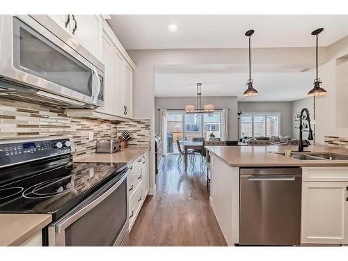 54 Copperpond Heath Se, Calgary, AB - Indoor Photo Showing Kitchen With Double Sink With Upgraded Kitchen