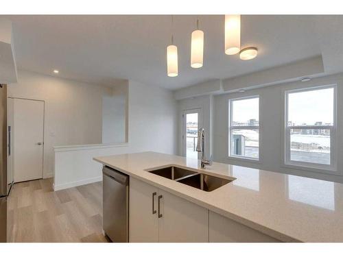 40-2117 81 Street Sw, Calgary, AB - Indoor Photo Showing Kitchen With Double Sink