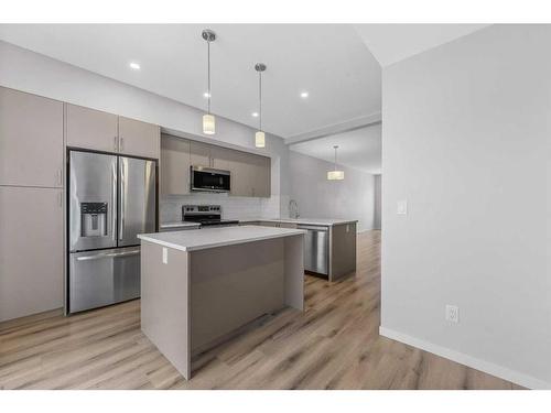 230 South Point Park Sw, Airdrie, AB - Indoor Photo Showing Kitchen With Stainless Steel Kitchen With Upgraded Kitchen