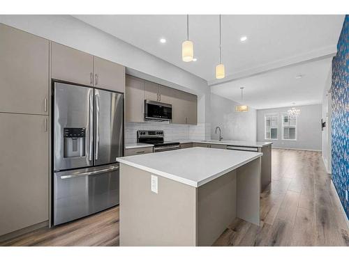 230 South Point Park Sw, Airdrie, AB - Indoor Photo Showing Kitchen With Stainless Steel Kitchen With Upgraded Kitchen