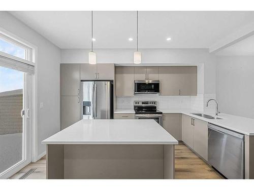 230 South Point Park Sw, Airdrie, AB - Indoor Photo Showing Kitchen With Stainless Steel Kitchen With Double Sink With Upgraded Kitchen