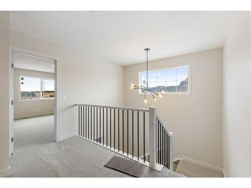 156 Sundown Crescent, Cochrane, AB - Indoor Photo Showing Other Room