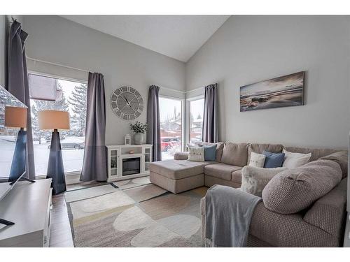 124 Macewan Glen Close Nw, Calgary, AB - Indoor Photo Showing Living Room With Fireplace