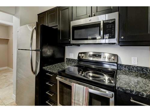 407-738 3 Avenue Sw, Calgary, AB - Indoor Photo Showing Kitchen With Stainless Steel Kitchen