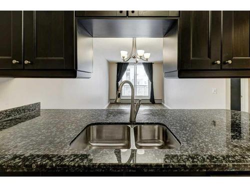 407-738 3 Avenue Sw, Calgary, AB - Indoor Photo Showing Kitchen With Double Sink