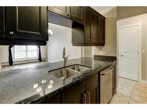 407-738 3 Avenue Sw, Calgary, AB - Indoor Photo Showing Kitchen With Double Sink