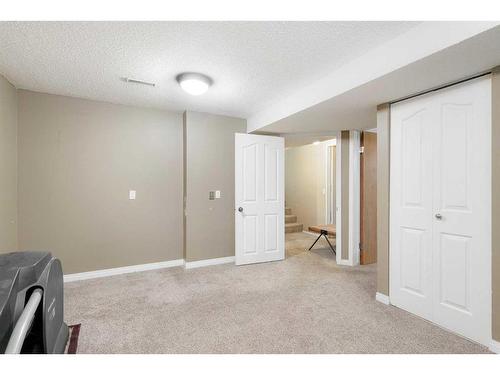 312 Silverthorn Way Nw, Calgary, AB - Indoor Photo Showing Other Room